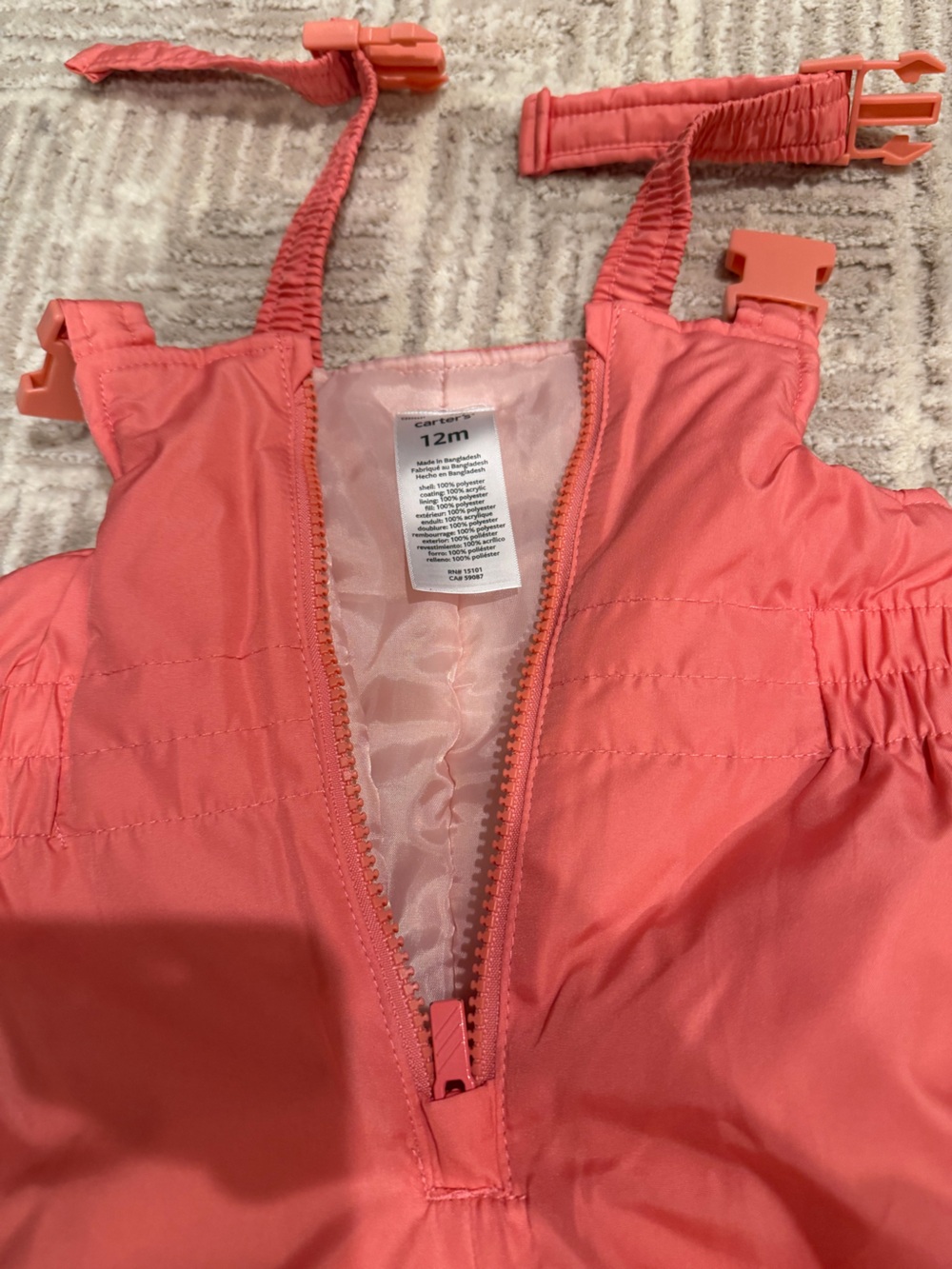 Pink Carter’s snowsuit